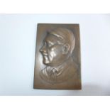 A BRONZE PLAQUE DEPICTING ADOLPH HITLER, MARKED WITH A SWASTIKA AND P.S. 13.5cm x 9cm