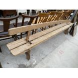 A VINTAGE WOODEN BENCH