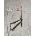AN ALLCOCK TWO PIECE SPLIT CANE FISHING ROD WITH ROD BAG