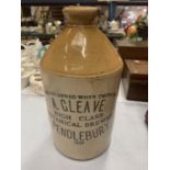 A 1939 STONEWARE JAR (A/F)