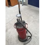 A VINTAGE PULL ALONG GARDEN SPRAYER