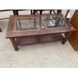 A MODERN MAHOGANY COFFEE TABLE WITH GLASS INSET TOP