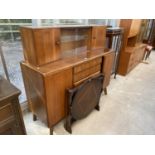 A NATHAN WALNUT SIDEBOARD WITH SLIDING GLASS DOORS, 54" WIDE AND A FOLDAWAY CARD TABLE