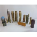 A COLLECTION OF BRASS SHELL CASES AND AN INERT 40mm GRENADE SHELL ETC