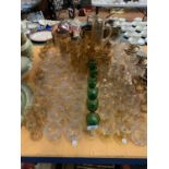 A LARGE QUANTITY OF GLASSWARE TO INCLUDE CRYSTAL CHAMPAGNE COUPE GLASSES