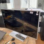 A PANASONIC 32 INCH TELEVISION WITH REMOTE, BELIEVED IN WORKING ORDER, NO WARRANTY