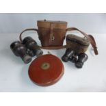 A CASED PAIR OF BINOCULARS, CASED PAIR OF OPERA GLASSES AND A TAPE MEASURE