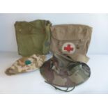 A MEDICAL KNAPSACK, FURTHER KNAPSACK AND TWO HATS, BANDAGE ETC