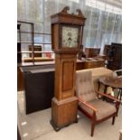 A CROSSBANDED OAK 30 HOUR LONG CASE CLOCK WITH FLORAL DECORATED DIAL