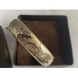 A BOXED SILVER BANGLE