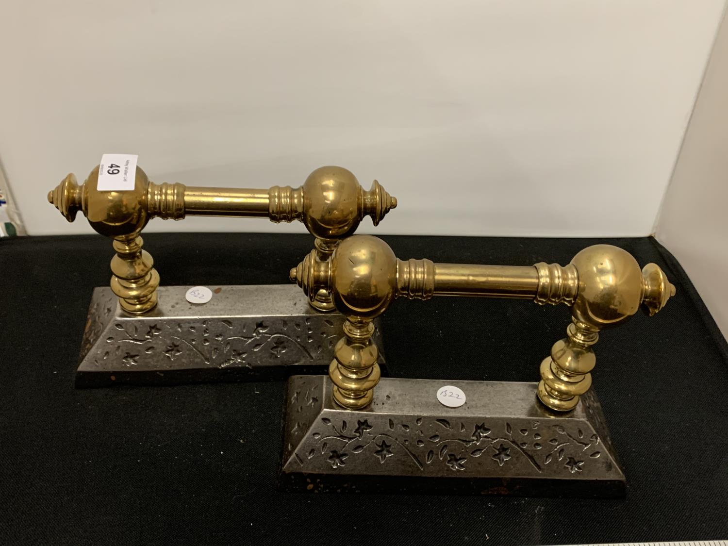 A PAIR OF BRASS FIRE IRON RESTS - Image 2 of 2