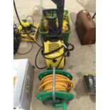 A KARCHER PRESSURE WASHER AND GARDEN HOSE