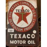 A METAL VINTAGE STYLE TEXACO MOTOR OIL SIGN 20CM X 30CM