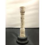 AN ORIENTAL BONE CANDLESTICK