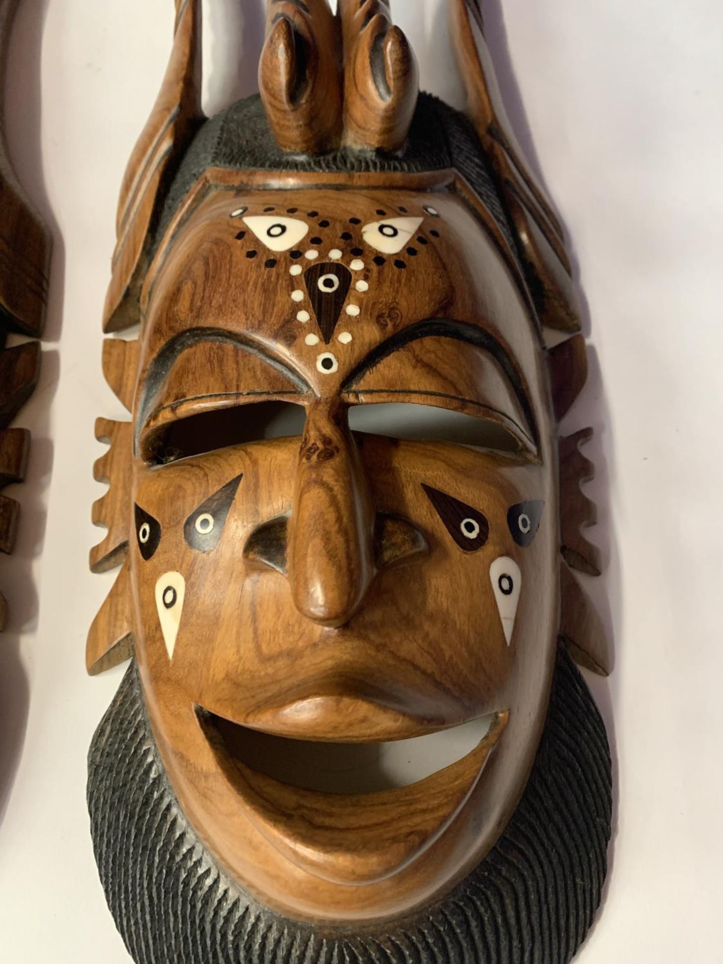 A PAIR OF HEAVILY CARVED INLAID TRIBAL MASKS - Image 7 of 15