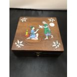 AN INLAID BOX DECORATED WITH TWO FIGURES AND FLOWERS