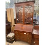 AN EDWARDIAN MAHOGANY AND INLAID BUREAU BOOKCASE WITH FOUR DRAWERS TO THE BASE, 36" WIDE