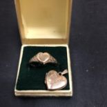 A 9CT GOLD RING AND A 9CT GOLD HEART SHAPED PENDANT