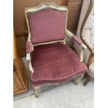 A CREAM AND GILT DECORATED CONTINENTAL STYLE OPEN ARMCHAIR