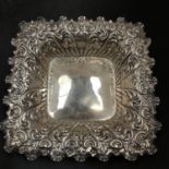 A HALLMARKED SILVER SQUARE ORNATE DISH