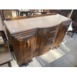 AN OAK SIDEBOARD