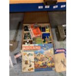 A LARGE WOODEN BOX CONTAINING ASSORTED MECCANO AND INSTRUCTION MANUALS