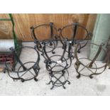 FIVE LARGE METAL PLANT HOLDERS WITH ONE FURTHER SMALLER PLANT HOLDER