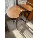 AN EDWARDIAN MAHOGANY AND CROSSBANDED KIDNEY SHAPED TWO TIER OCCASIONAL TABLE, 26" WIDE