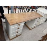 A MODERN PINE AND PAINTED DRESSING TABLE WITH EIGHT DRAWERS