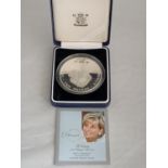 A 1997 SILVER PROOF FIVE OUNCE £10 COIN IN PRESENTATION BOX WITH CERTIFICATE
