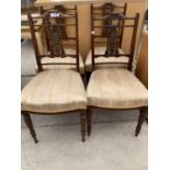 A SET OF FOUR EDWARDIAN MAHOGANY PARLOUR CHAIRS ON TURNED AND FLUTED LEGS