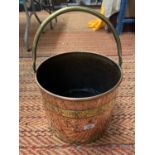 A BRASS AND COPPER COAL BUCKET