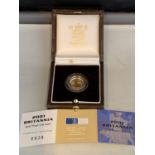 A BRITANNIA 2001 1/10TH oz GOLD PROOF £10 COIN IN PRESENTATION BOX WITH CERTIFICATE