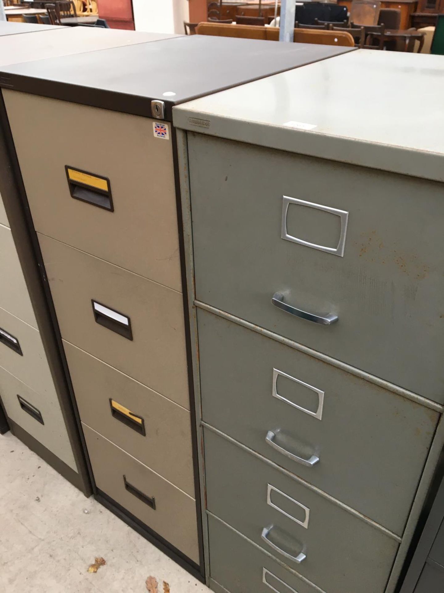 TWO TRIUMPH FOUR DRAWER METAL FILING CABINETS