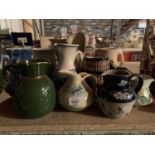 A COLLECTION OF VINTAGE AND RETRO CERAMIC JUGS OF VARIOUS DESIGNS