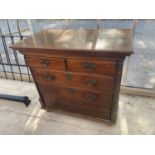 A GEORGE III MAHOGANY CHEST OF TWO SHORT AND THREE GRADUATED DRAWERS, 42" WIDE