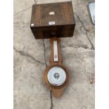 AN INLAID WALNUT JEWELLERY BOX AND AN OAK BAROMETER