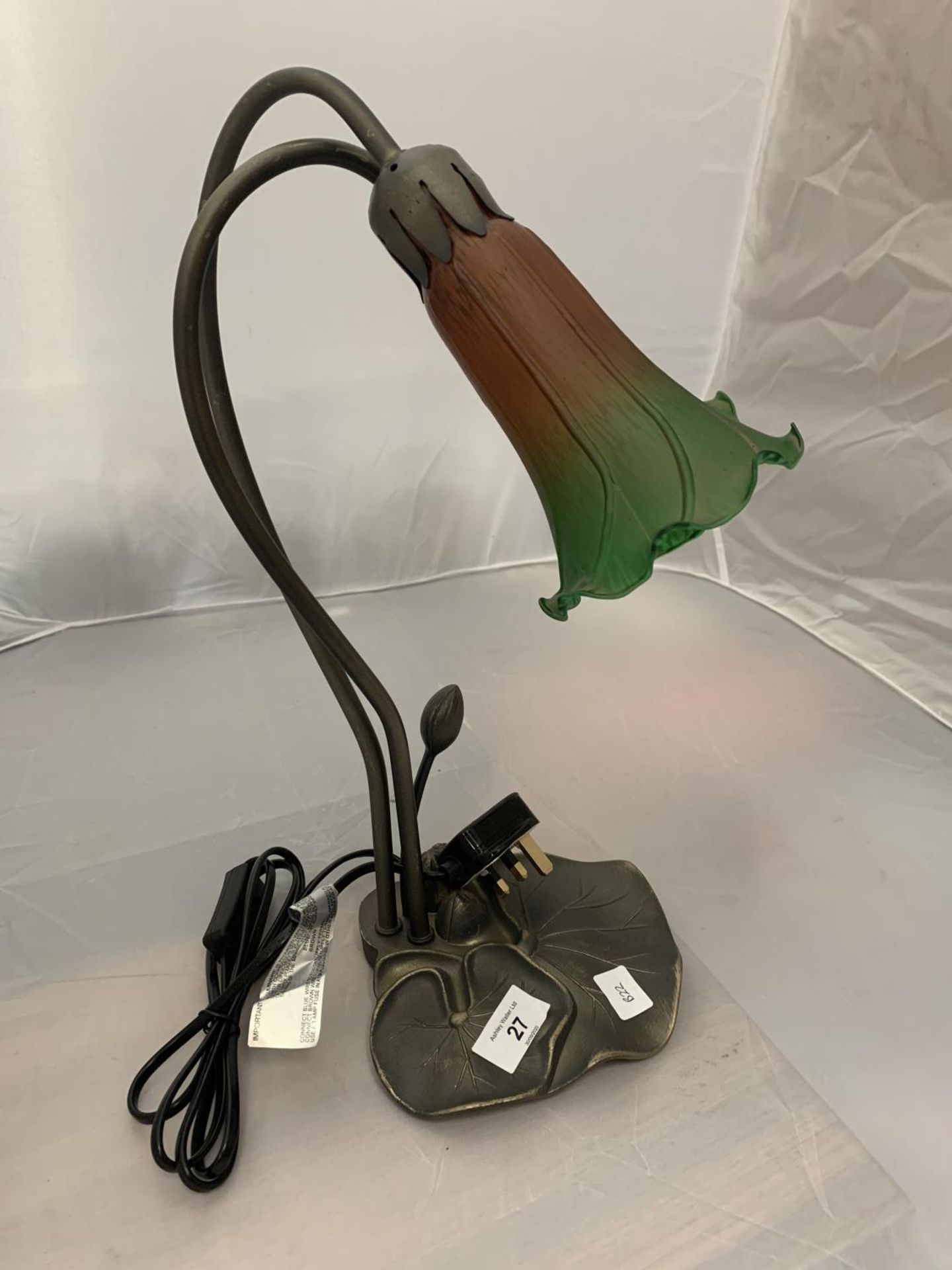 A TIFFANY LAMP WITH DOUBLE LILY SHADES