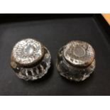 TWO GLASS TRINKET HOLDERS WITH HALLMARKED SILVER LIDS