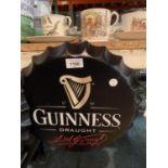 A VINTAGE GARAGE RETRO GUINNESS HANGING BOTTLE TOP DISPLAY SIGN 35CM