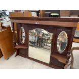 A MAHOGANY OVERMANTEL WITH CARVED AND TURNED COLUMNS AND THREE BEVEL EDGED MIRRORS, 62" WIDE