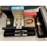 A SELECTION OF BOXED GOLD COLOURED LADIES AND GENTLEMENS WRISTWATCHES TO INCLUDE ONE WITH MATCHING
