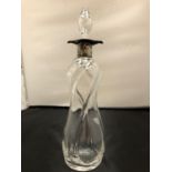 A HALLMARKED SILVER AND CUT GLASS DECANTER