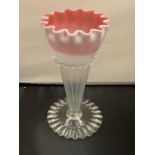 AN ELEGANT FLUTED CRANBERRY AND WHITE GLASS VASE
