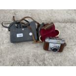 A ZEISS CONTINA CAMERA WITH LEATHER CASE AND A PAIR OF SWALLOW 8 X 30 BINOCULARS WITH CASE