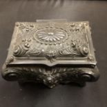 AN ORNATE METAL BOX