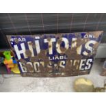 A VINTAGE ENAMEL HILTONS BOOTS AND SHOES SIGN