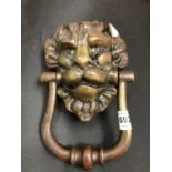 A GEORGIAN LION'S HEAD DOOR KNOCKER