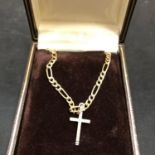 A 9CT GOLD CROSS AND CHAIN