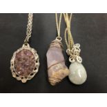THREE AMETHYST AND CRYSTAL NECKLACES